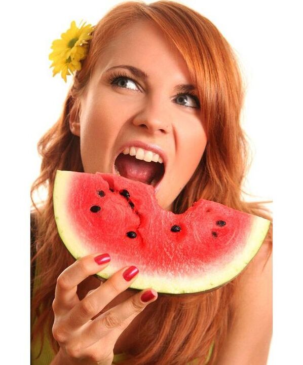 Girl eating watermelon on a watermelon diet
